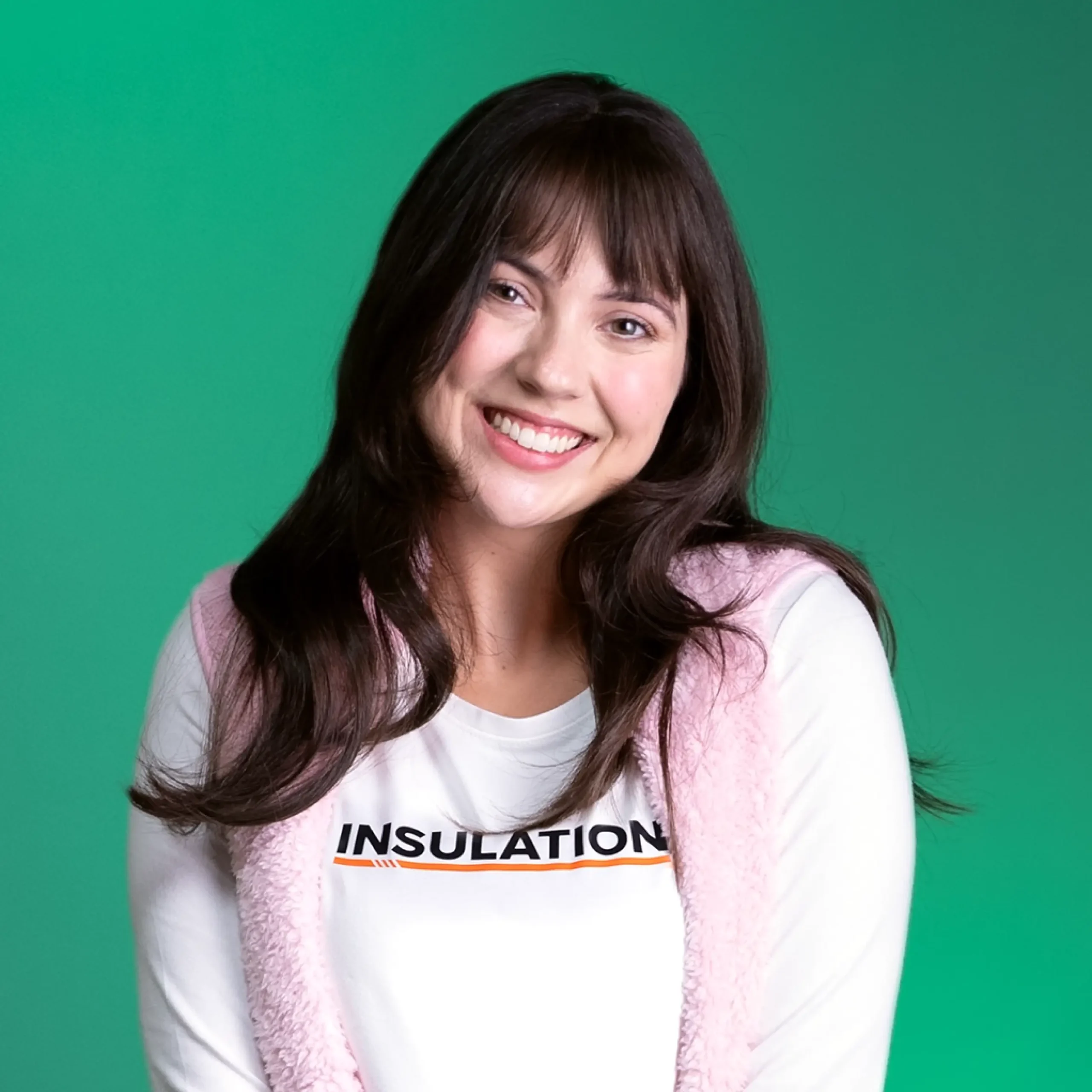 Woman wearing a shirt labeled insulation.